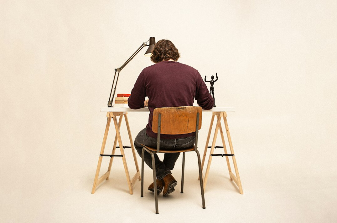 mystery writer at desk