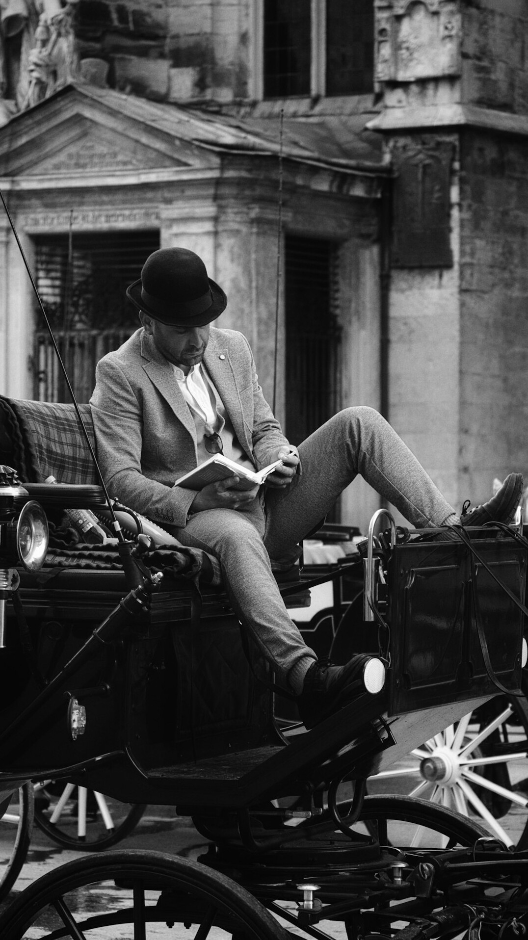 detective reading old book