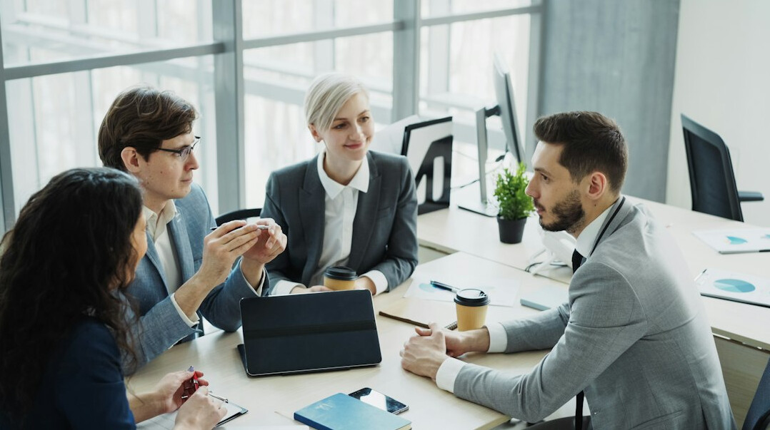 group of people in discussion